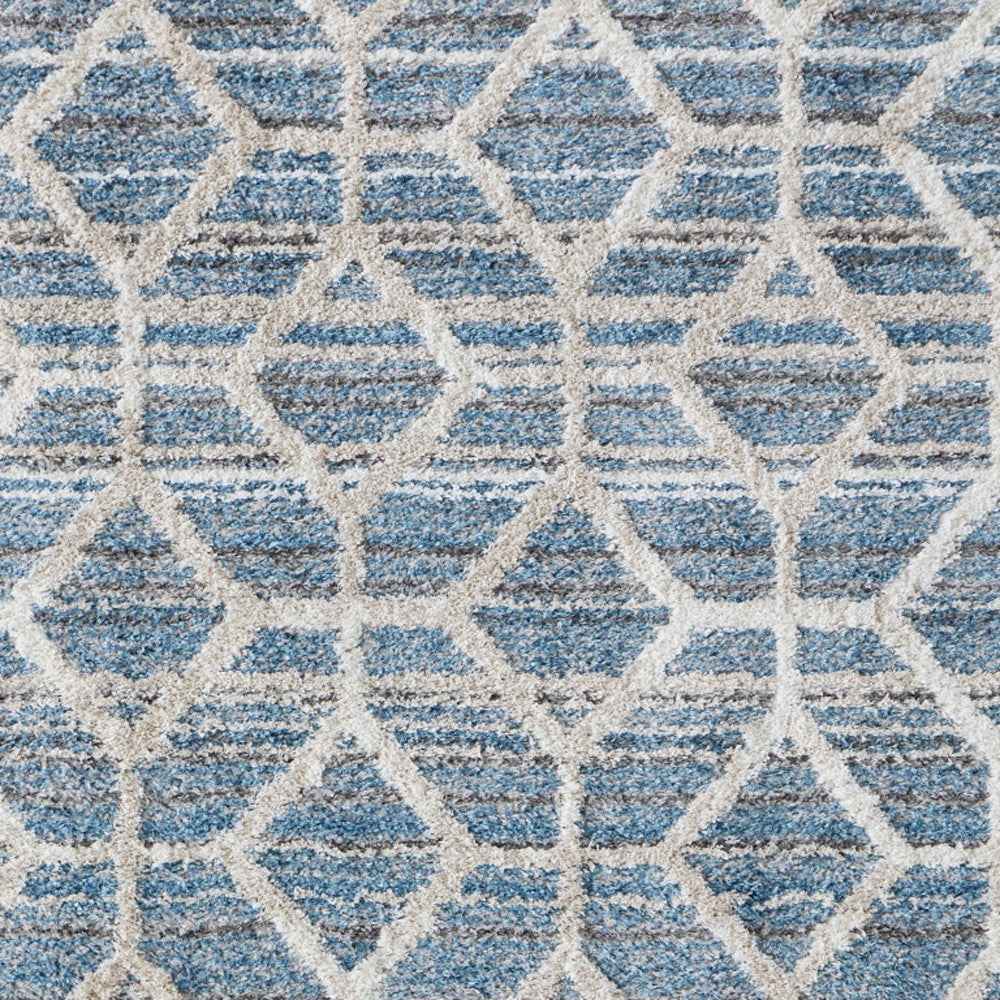 4' X 6' Blue And Ivory Geometric Power Loom Stain Resistant Area Rug