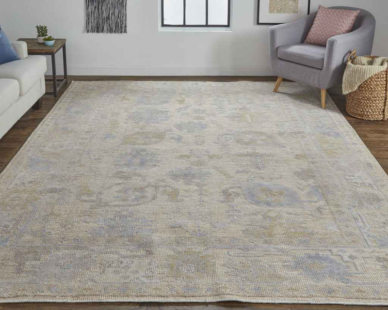 9' X 12' Tan Orange And Blue Floral Hand Knotted Stain Resistant Area Rug