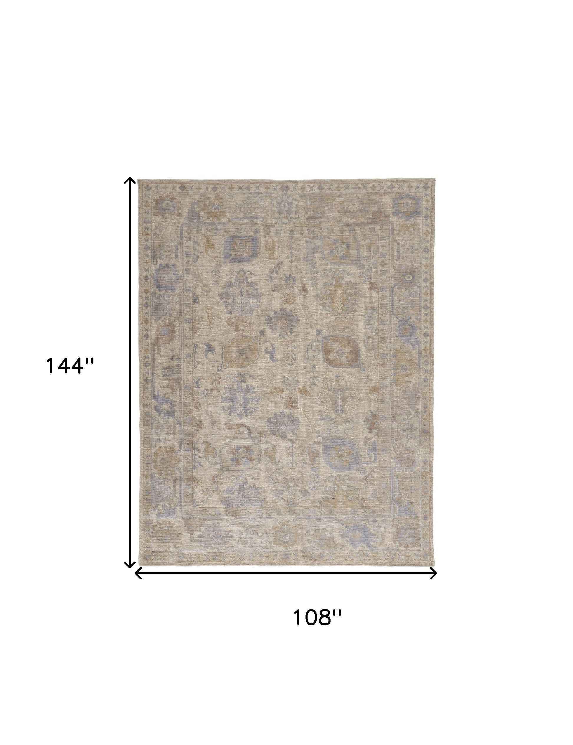 9' X 12' Tan Orange And Blue Floral Hand Knotted Stain Resistant Area Rug