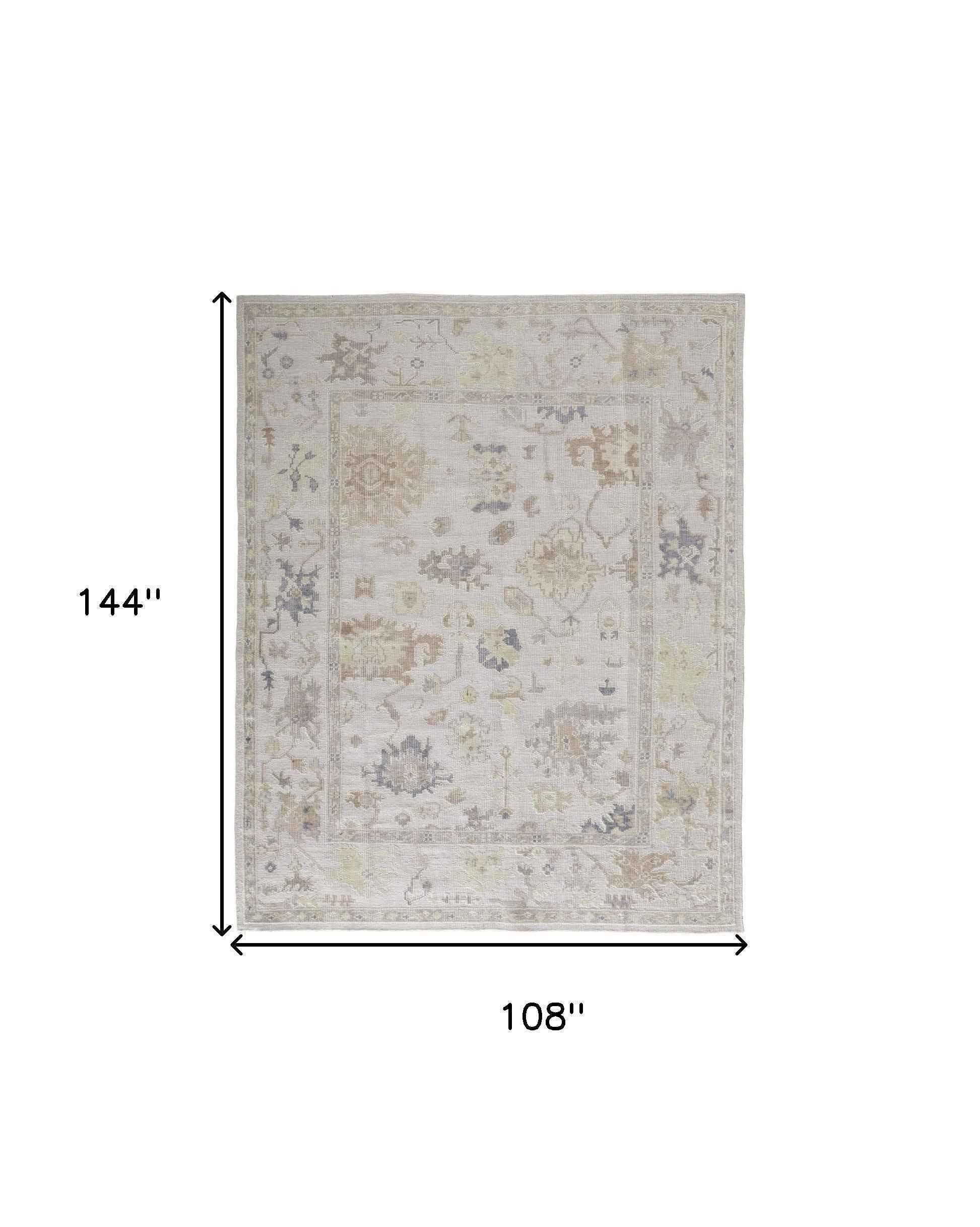 9' X 12' Tan Ivory And Orange Floral Hand Knotted Stain Resistant Area Rug