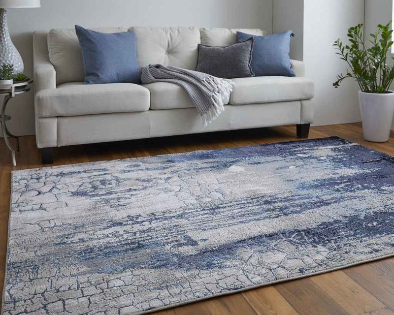 2' X 3' Ivory Blue And Black Abstract Power Loom Distressed Area Rug