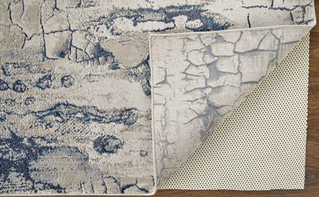 2' X 3' Ivory Blue And Black Abstract Power Loom Distressed Area Rug