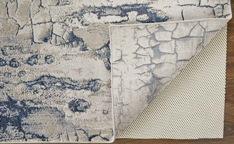 2' X 3' Ivory Blue And Black Abstract Power Loom Distressed Area Rug
