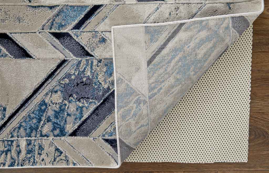 2' X 3' Ivory Blue And Gray Chevron Power Loom Distressed Area Rug