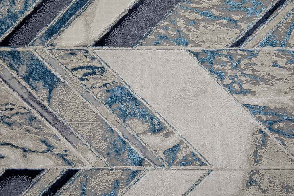 2' X 3' Ivory Blue And Gray Chevron Power Loom Distressed Area Rug