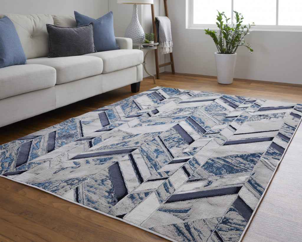 2' X 3' Ivory Blue And Gray Chevron Power Loom Distressed Area Rug