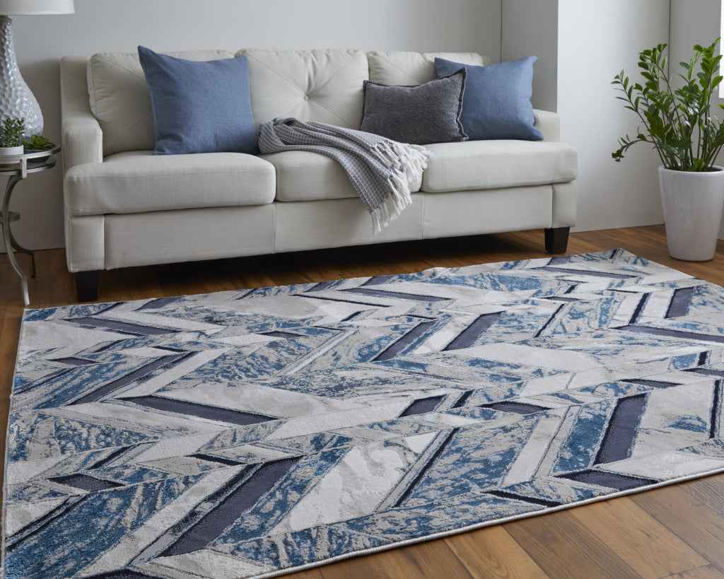 2' X 3' Ivory Blue And Gray Chevron Power Loom Distressed Area Rug