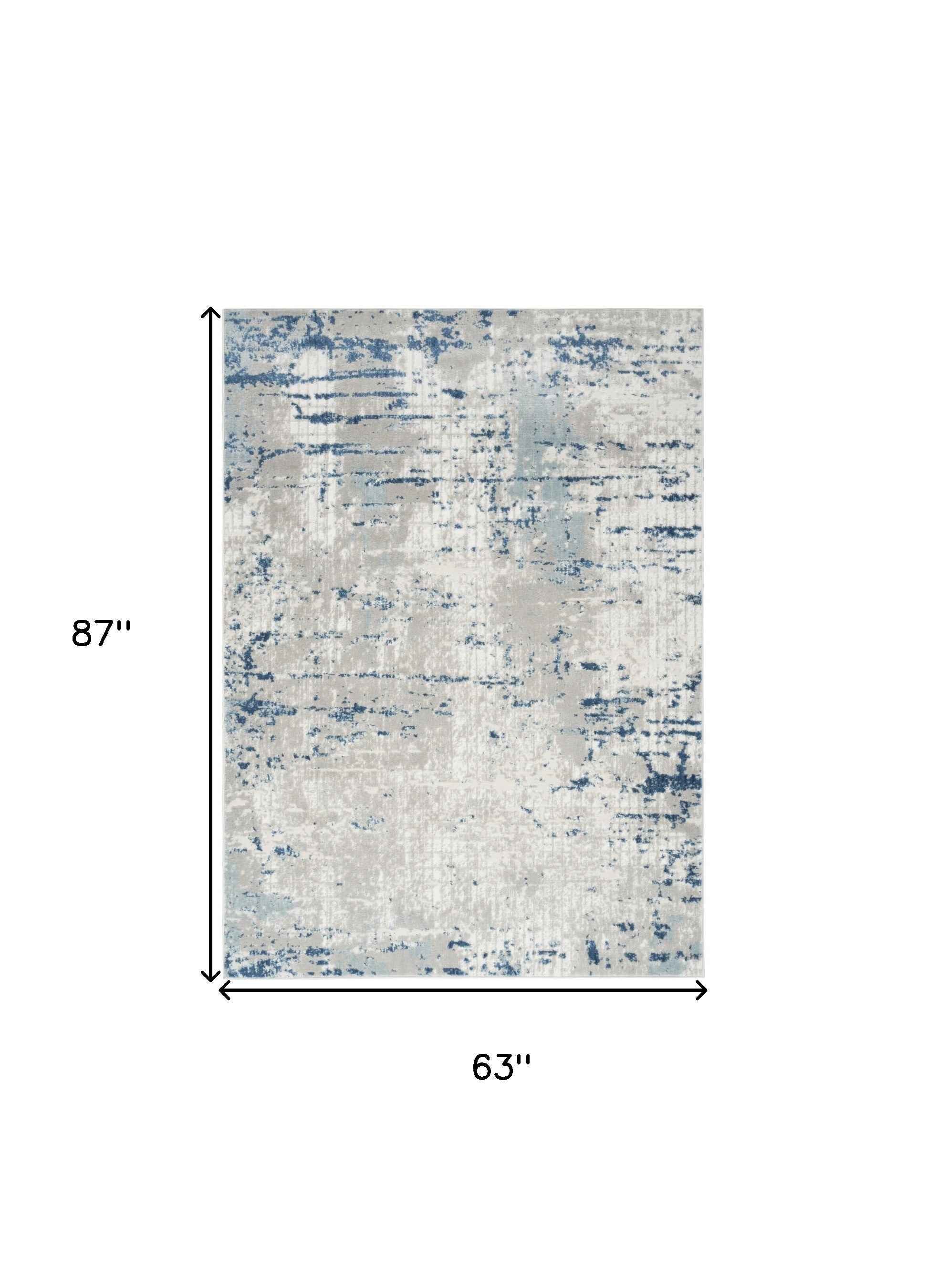 5' x 7' Ivory Abstract Power Loom Area Rug