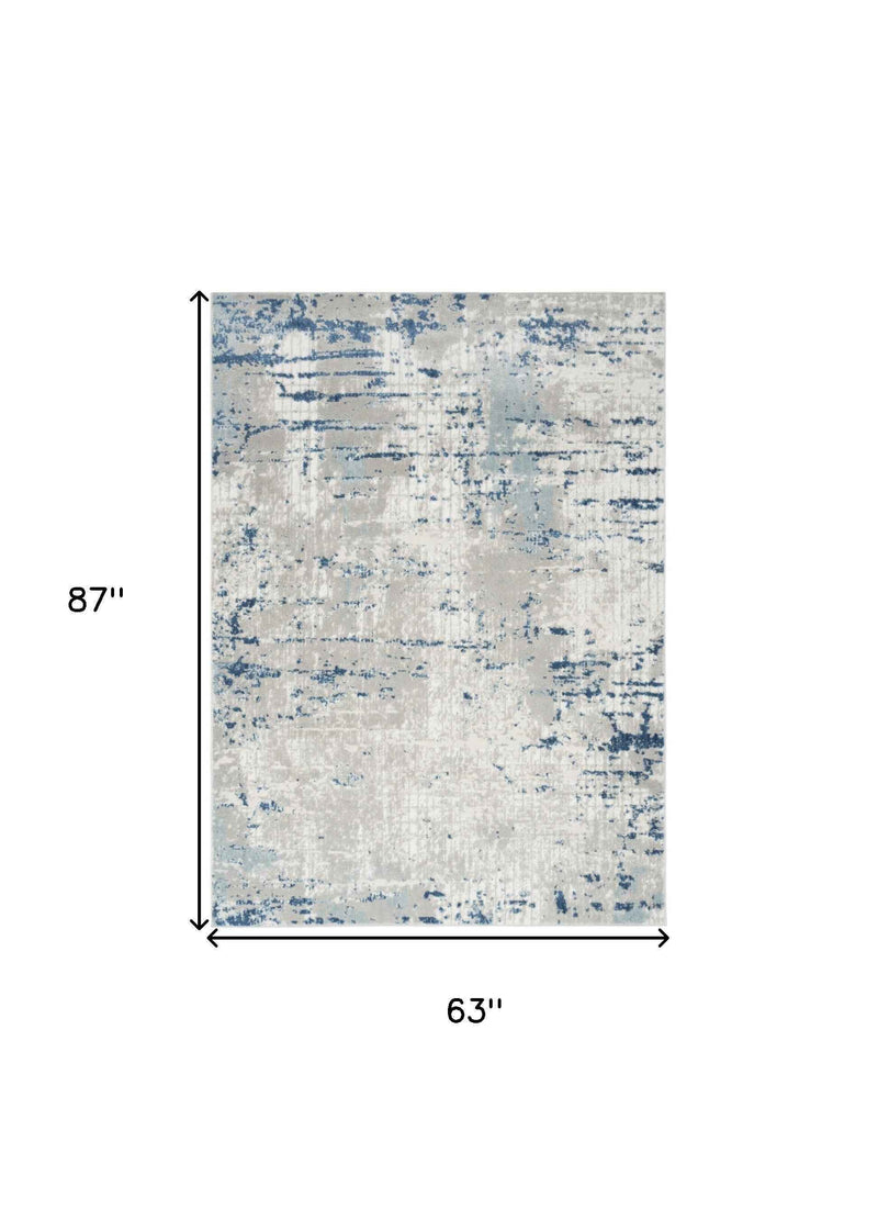 5' x 7' Ivory Abstract Power Loom Area Rug