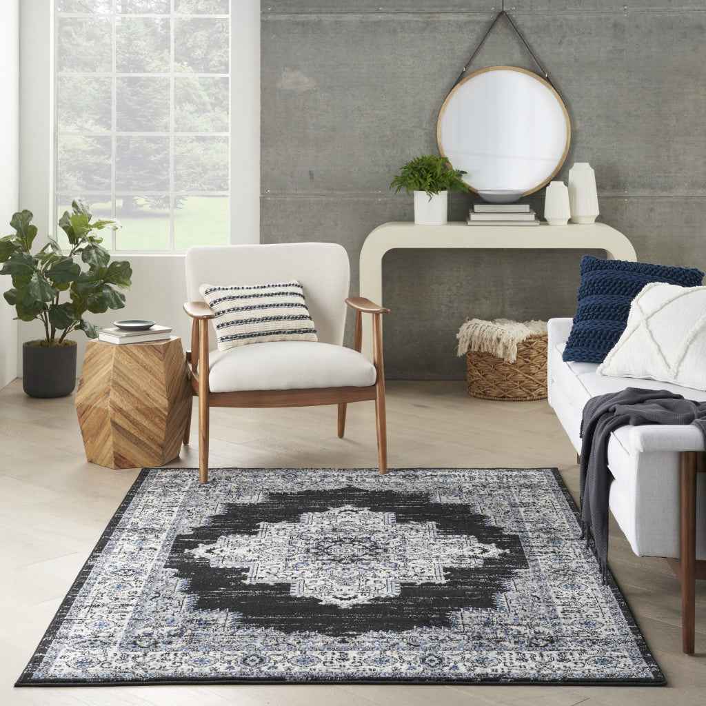5' X 7' Black Floral Power Loom Distressed Area Rug
