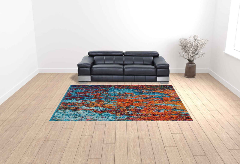 9' x 12' Blue and Orange Abstract Power Loom Area Rug