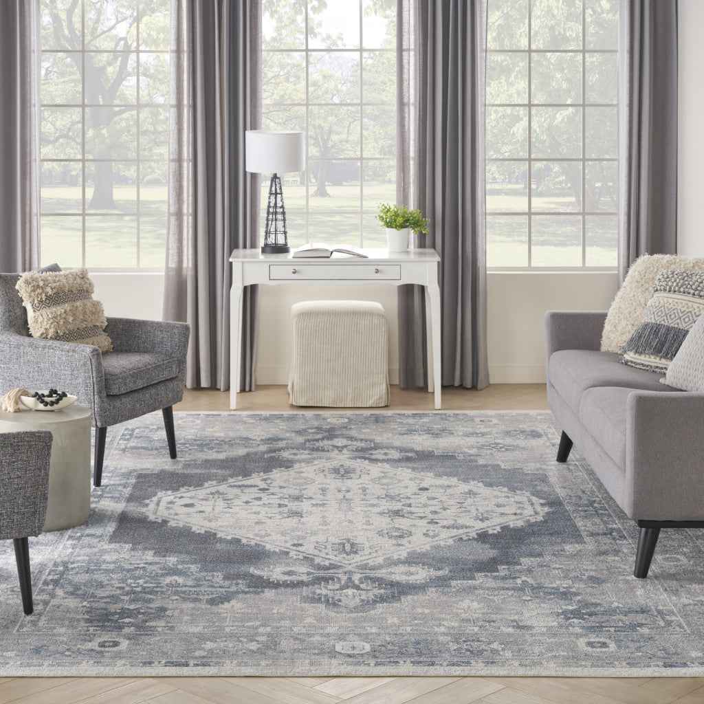 9' x 12' Blue and Ivory Oriental Power Loom Distressed Area Rug
