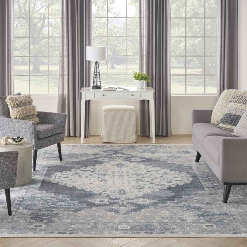 9' x 12' Blue and Ivory Oriental Power Loom Distressed Area Rug