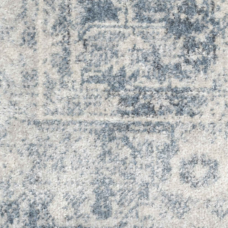 9' x 12' Blue and Ivory Oriental Power Loom Distressed Area Rug