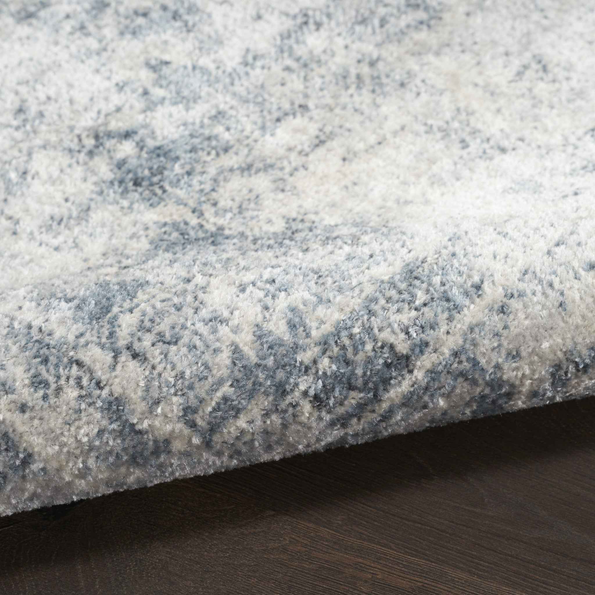 9' x 12' Blue and Ivory Oriental Power Loom Distressed Area Rug