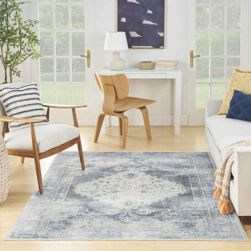 5' X 7' Blue Oriental Power Loom Distressed Washable Area Rug