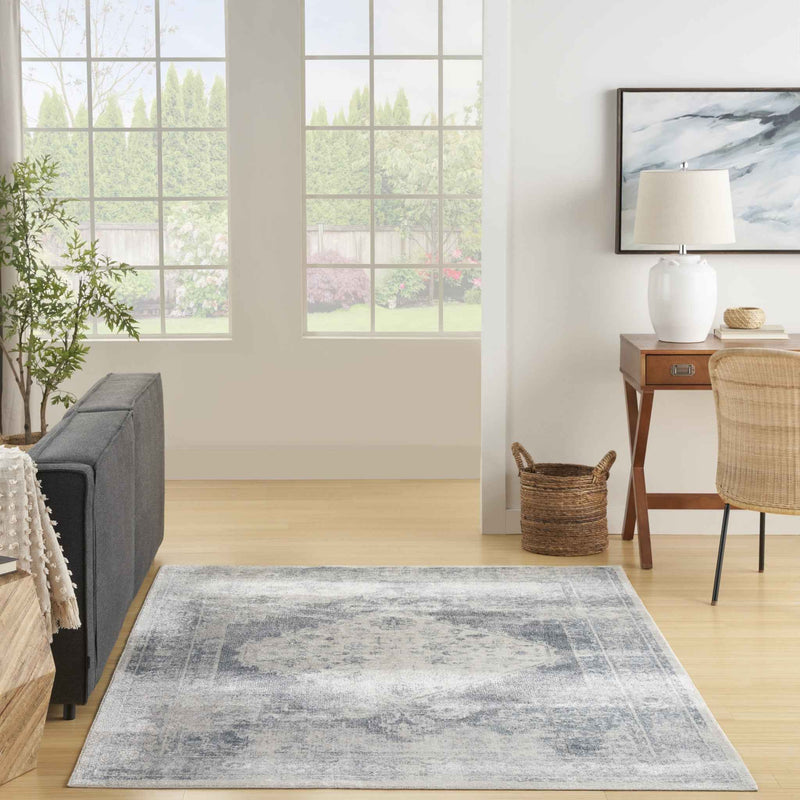 5' X 7' Blue Oriental Power Loom Distressed Washable Area Rug