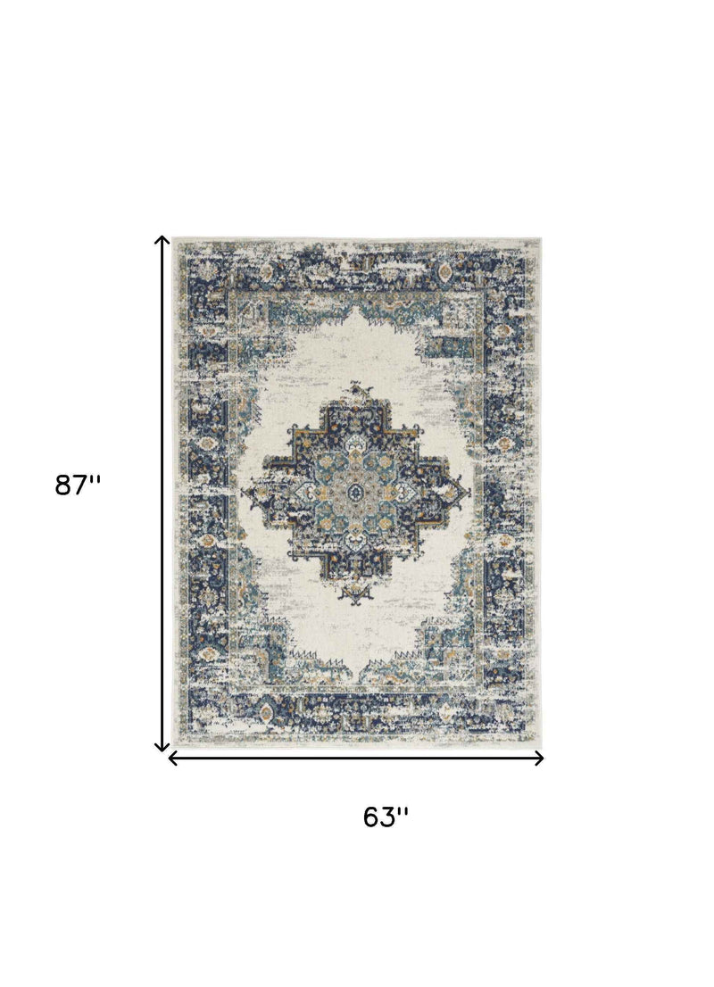 5' X 7' Cream Floral Power Loom Distressed Area Rug