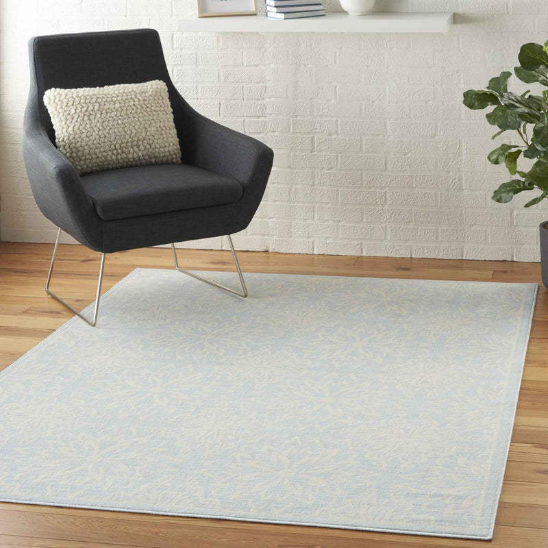 6' X 9' Light Blue Floral Power Loom Area Rug