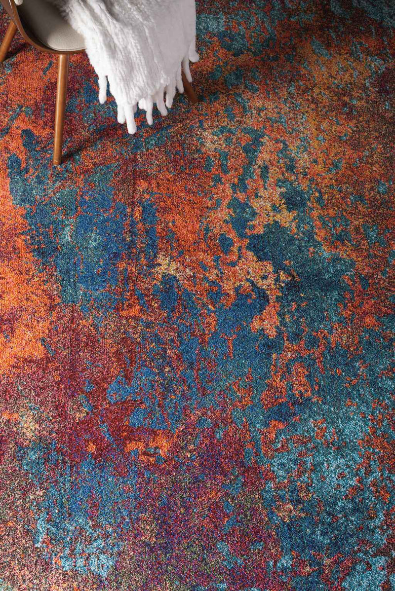 7' x 10' Blue and Orange Abstract Power Loom Area Rug