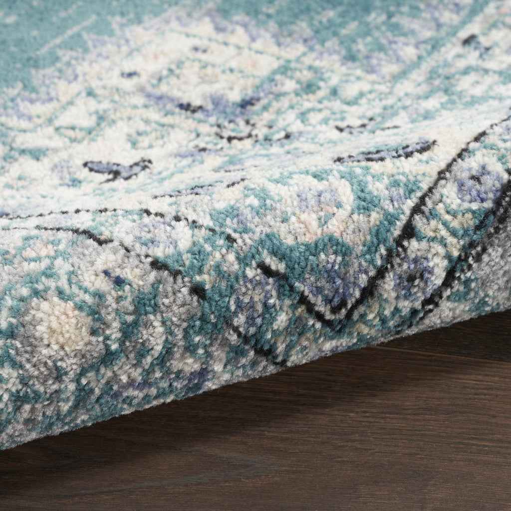 5' x 7' Aqua Floral Power Loom Distressed Area Rug