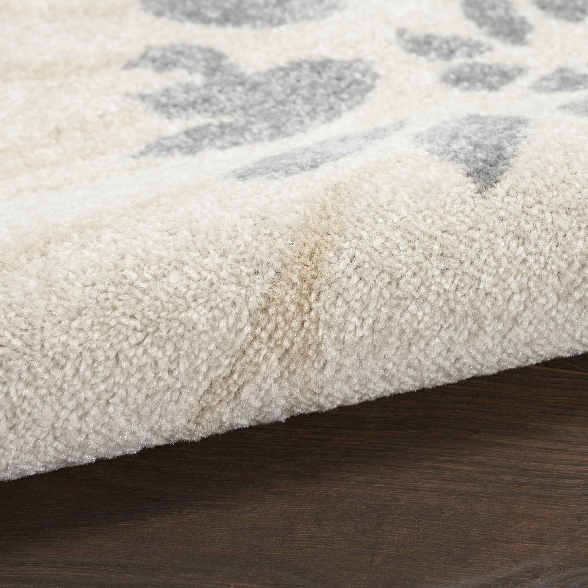 5' x 7' Cream Floral Power Loom Distressed Area Rug