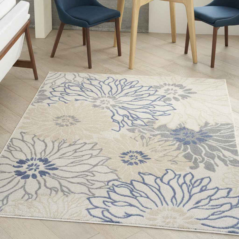 5' x 7' Cream Floral Power Loom Distressed Area Rug