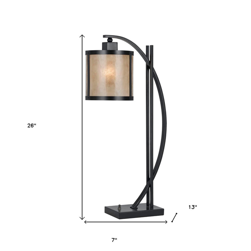 Black metal lantern table lamp with curved frame and square glass lantern