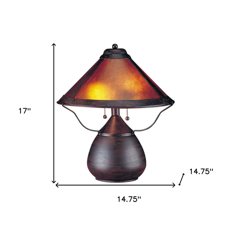 Rust-brown two-light table lamp, 17 in tall, 14.75 in wide; amber empire shade
