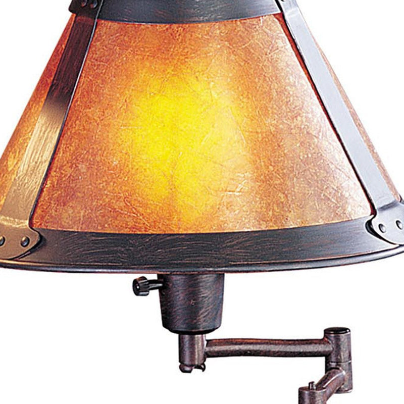 Amber empire shade close-up with bronze trim and adjustable lamp socket