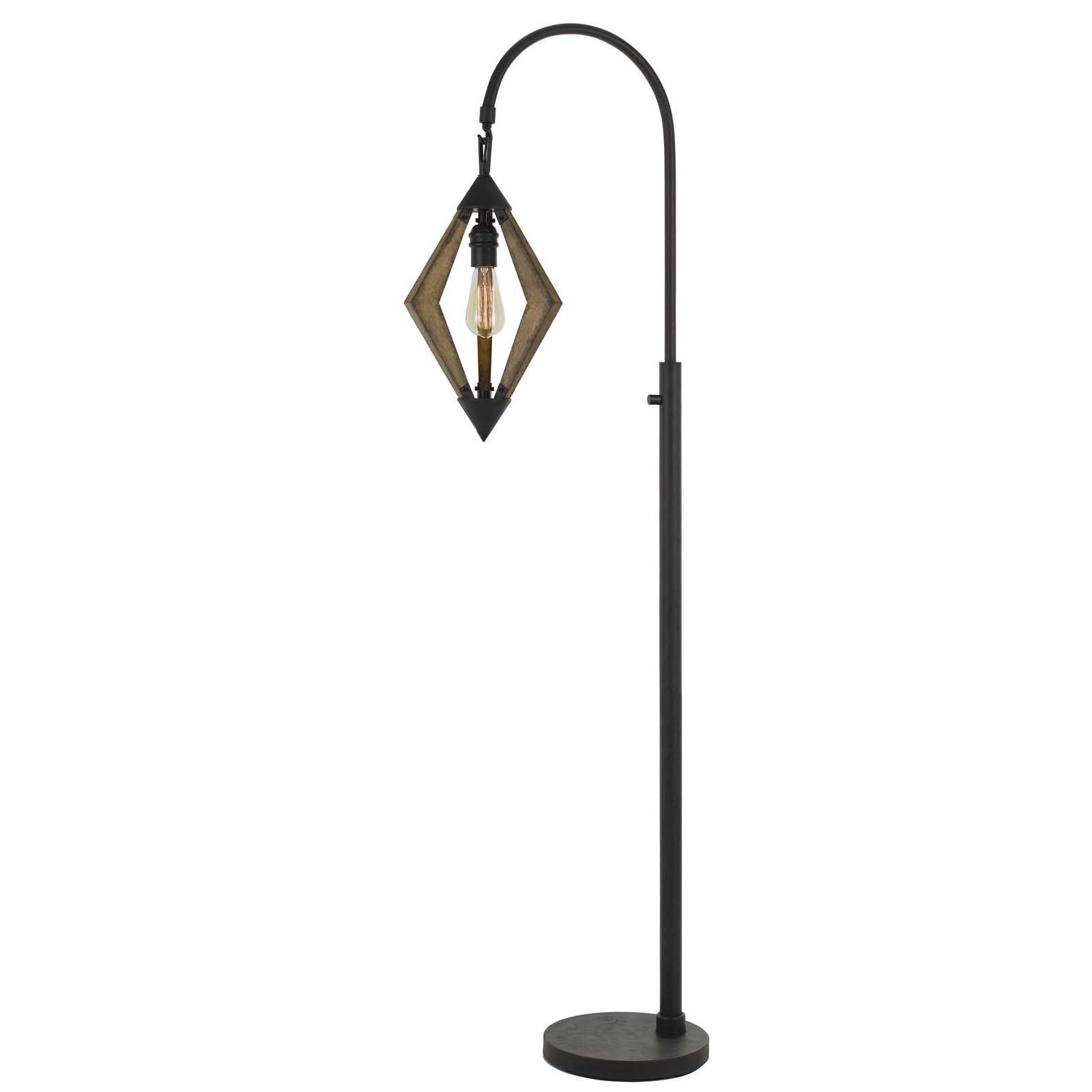 Black metal floor lamp with gold accents and a diamond-shaped glass shade. Ideal for modern and industrial decor.