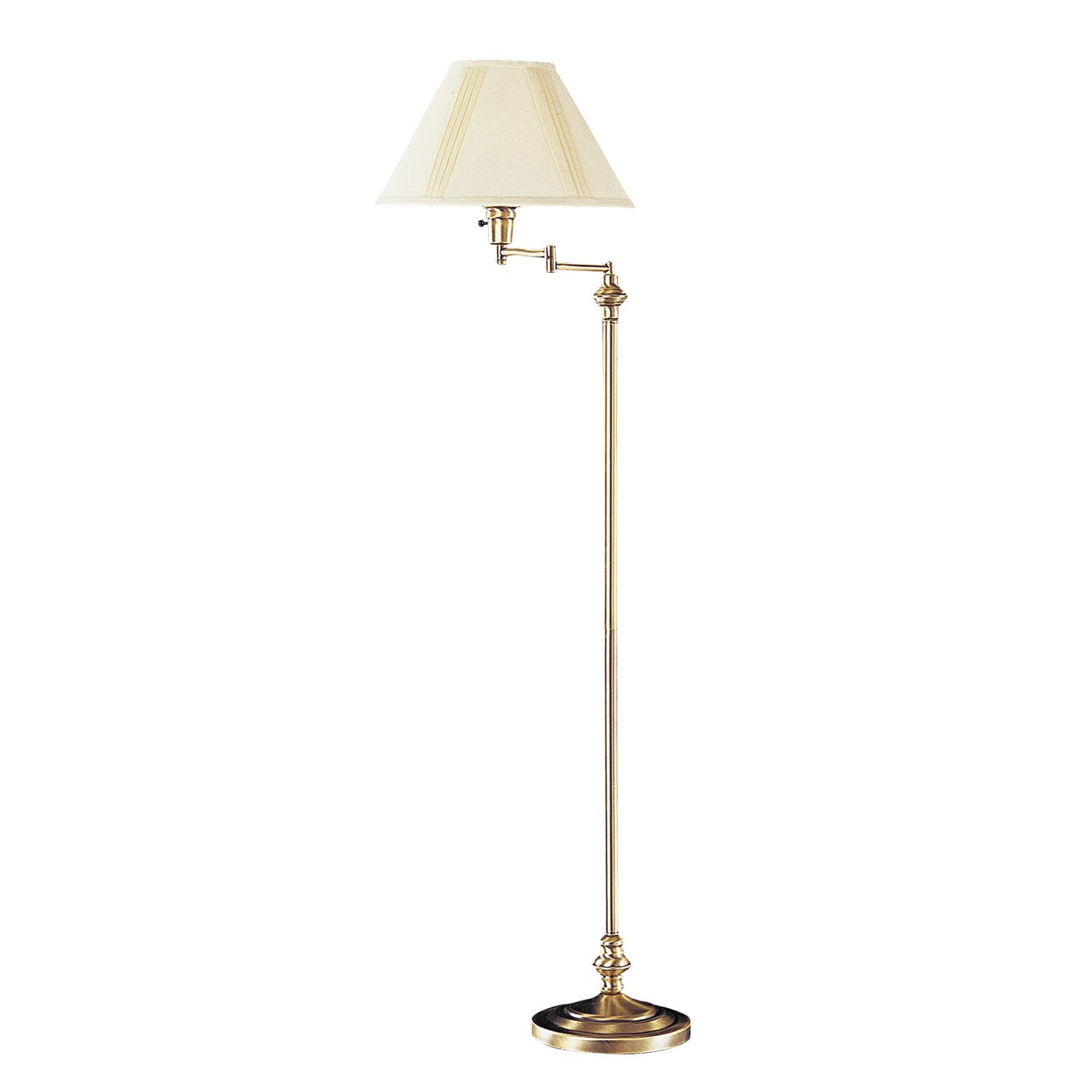 Brass adjustable floor lamp with cream fabric shade, traditional style, perfect for cozy living spaces.