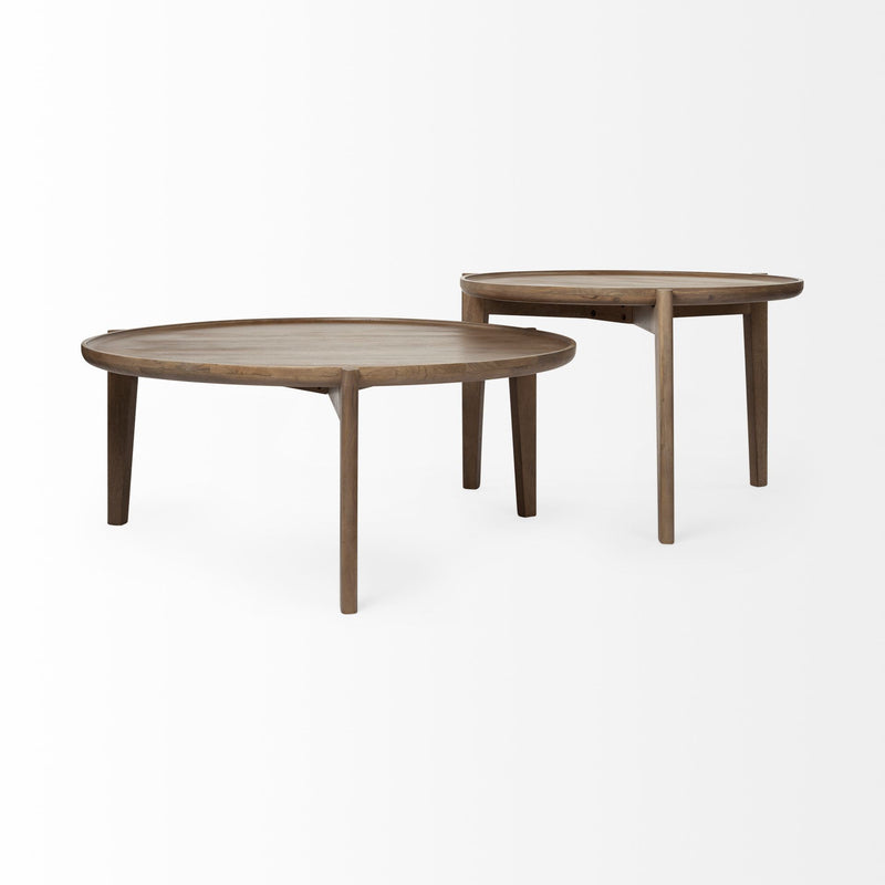 Two nested round coffee tables with matching wood grain tops and slender legs