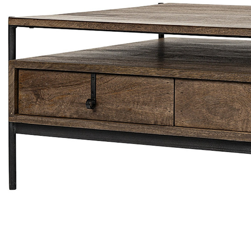 Brown wood coffee table with two drawers and black metal pulls, set into metal frame