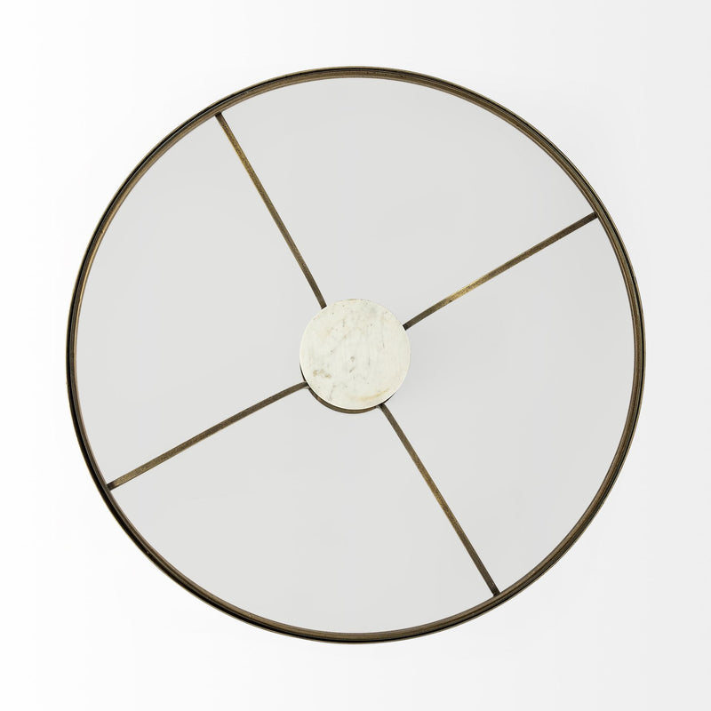 Top view of round glass coffee table with gold iron support lines and marble center