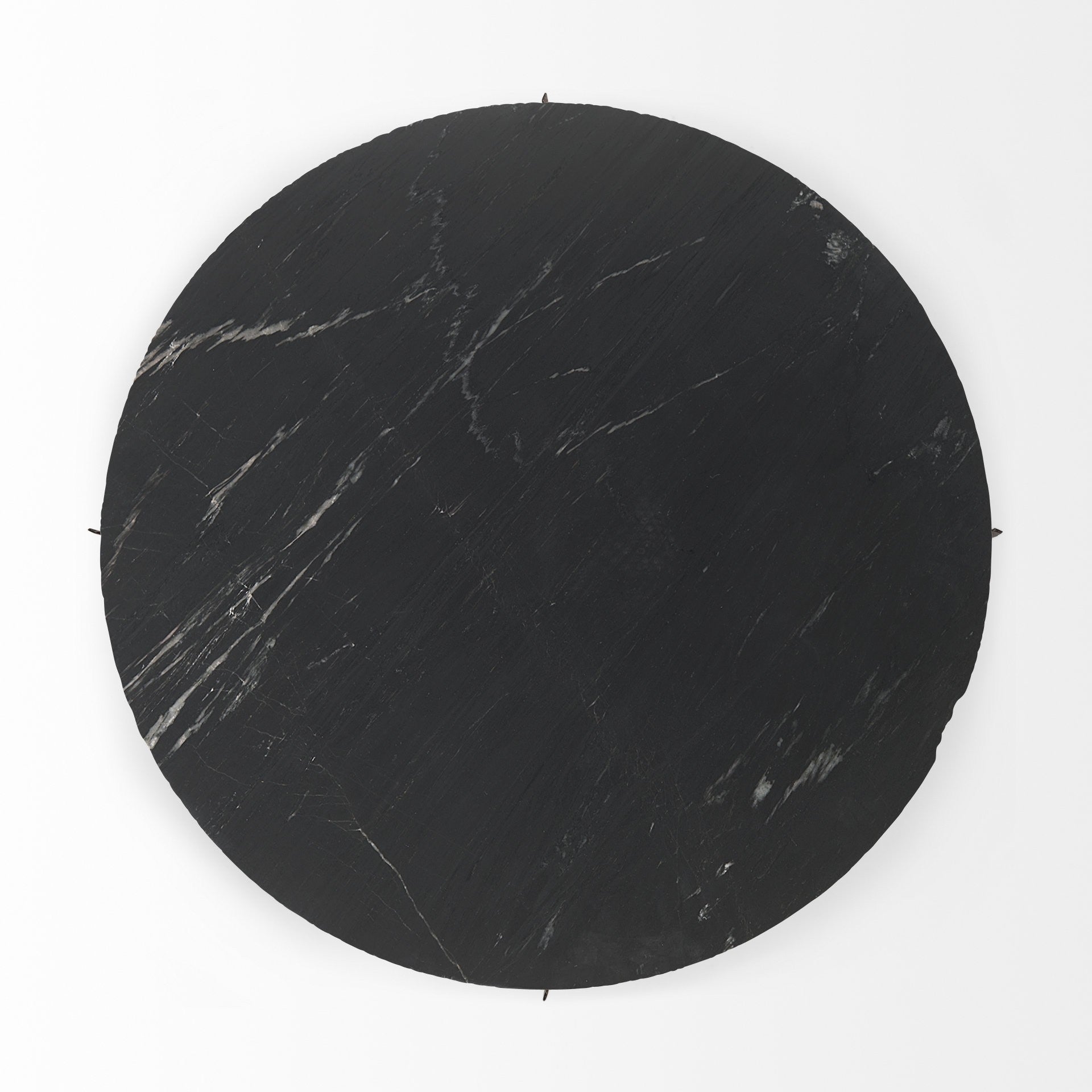 Round black marble tabletop with subtle white veining