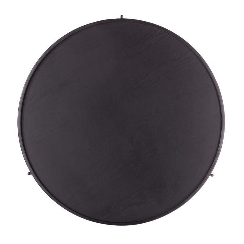 Round coffee table top view, dark wood surface with black metal rim and support posts