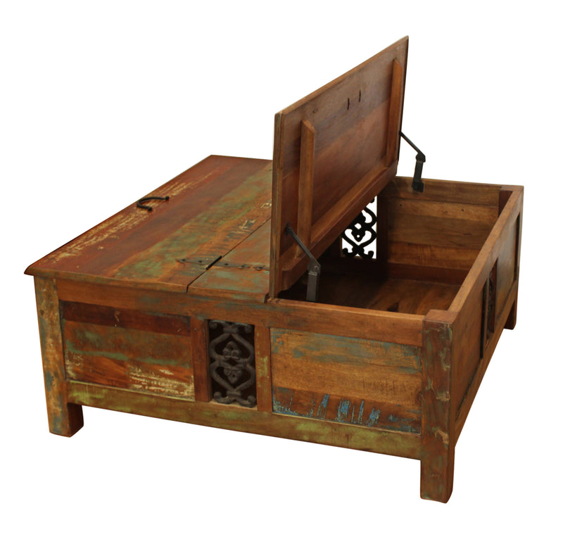 Brown lift-top trunk coffee table with open lid and interior storage with metal braces