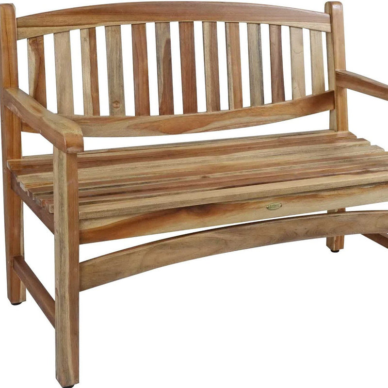 Teak bench with slatted seat and back, curved arm rail, and small emblem