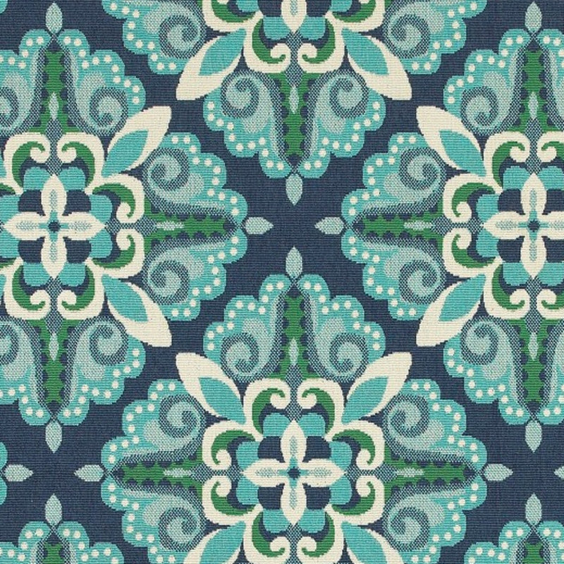 Indoor outdoor area rug close-up of navy and teal floral medallion with cream accents