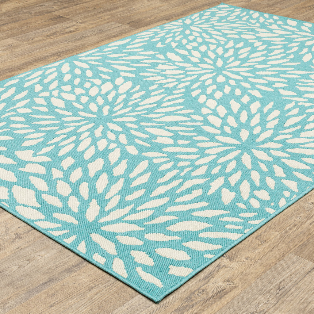 7' x 10' Blue and Ivory Floral Stain Resistant Indoor Outdoor Area Rug - Outdoor