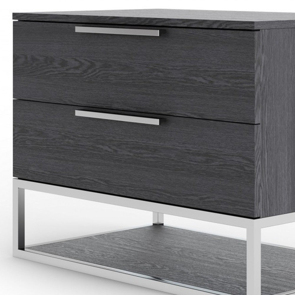 Gray solid wood nightstand with two drawers and lower shelf, close side angle.