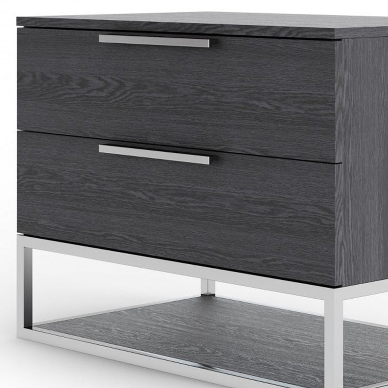 Gray solid wood nightstand with two drawers and lower shelf, close side angle.