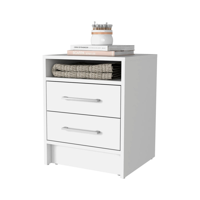 White wood nightstand with open shelf and two drawers, blanket and books on top
