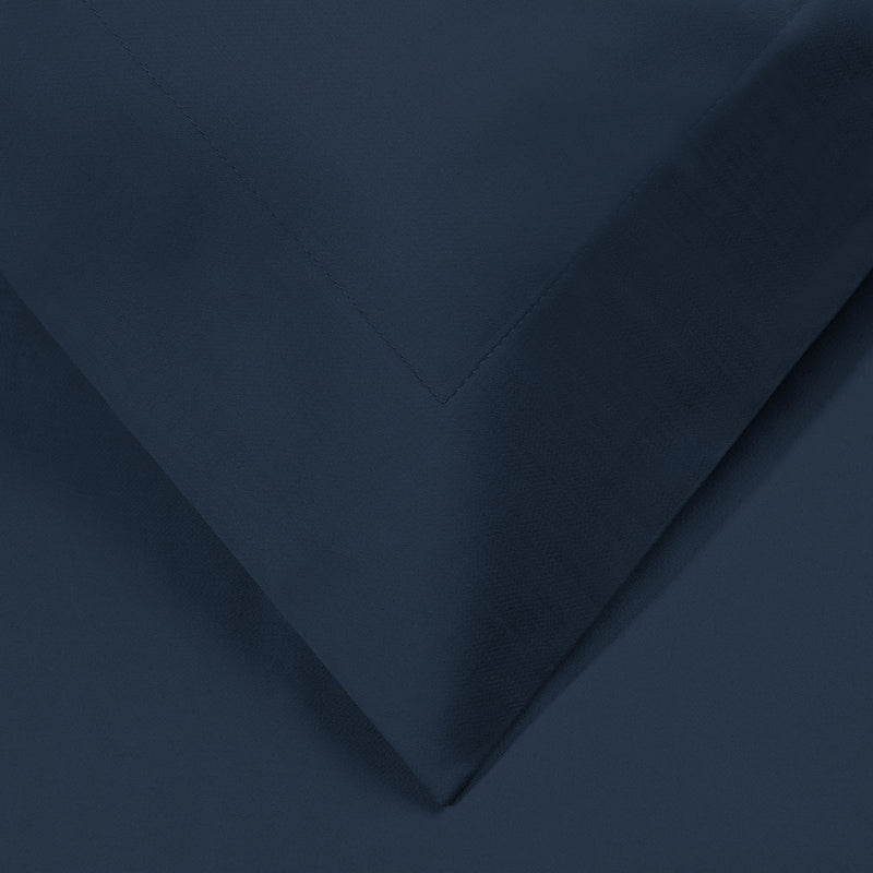 Navy duvet cover corner with stitched seam detail