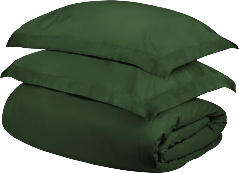 Solid dark green duvet cover set, folded with smooth fabric and corner fold