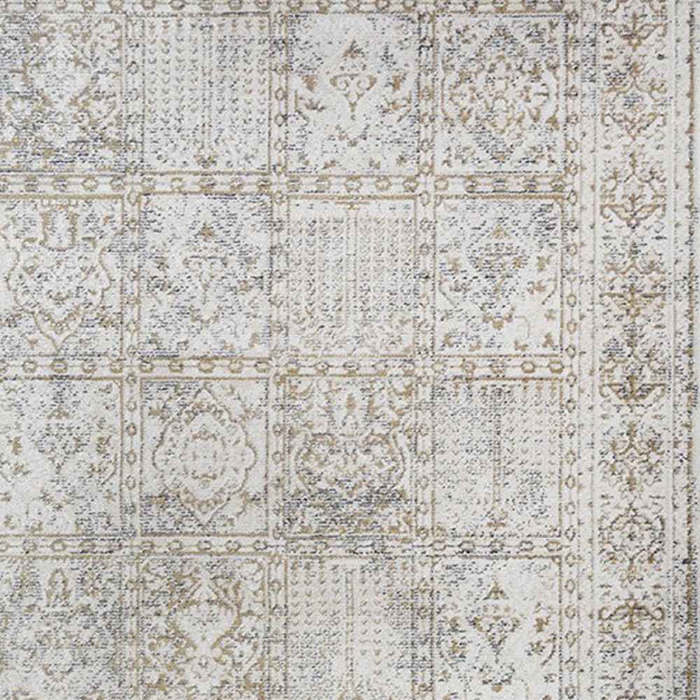 5' x 8' Ivory Oriental Distressed Area Rug With Fringe