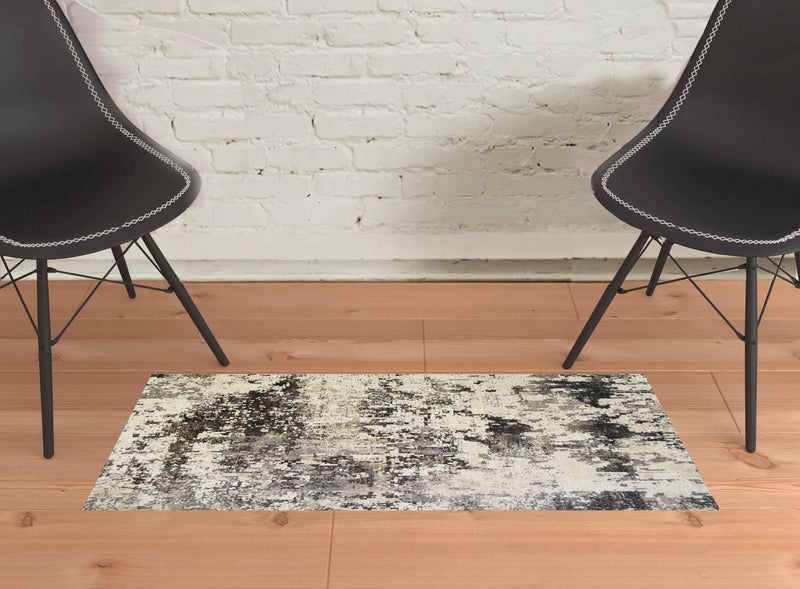 2' x 3' Black Abstract Distressed Area Rug With Fringe
