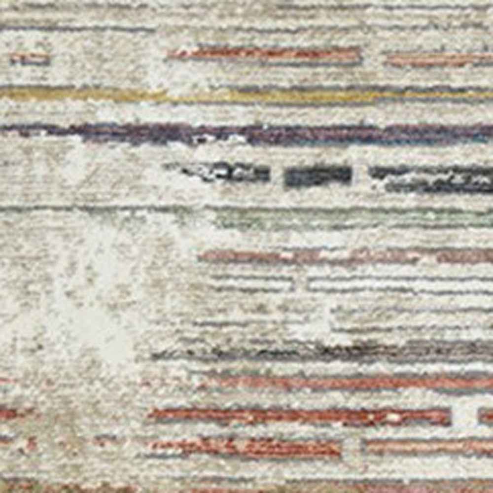 2' x 3' Beige Geometric Distressed Area Rug With Fringe