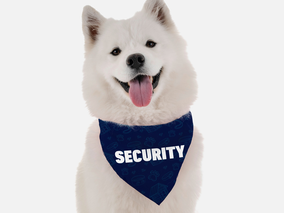 White dog with dark blue triangular bandana, SECURITY text centered on bib